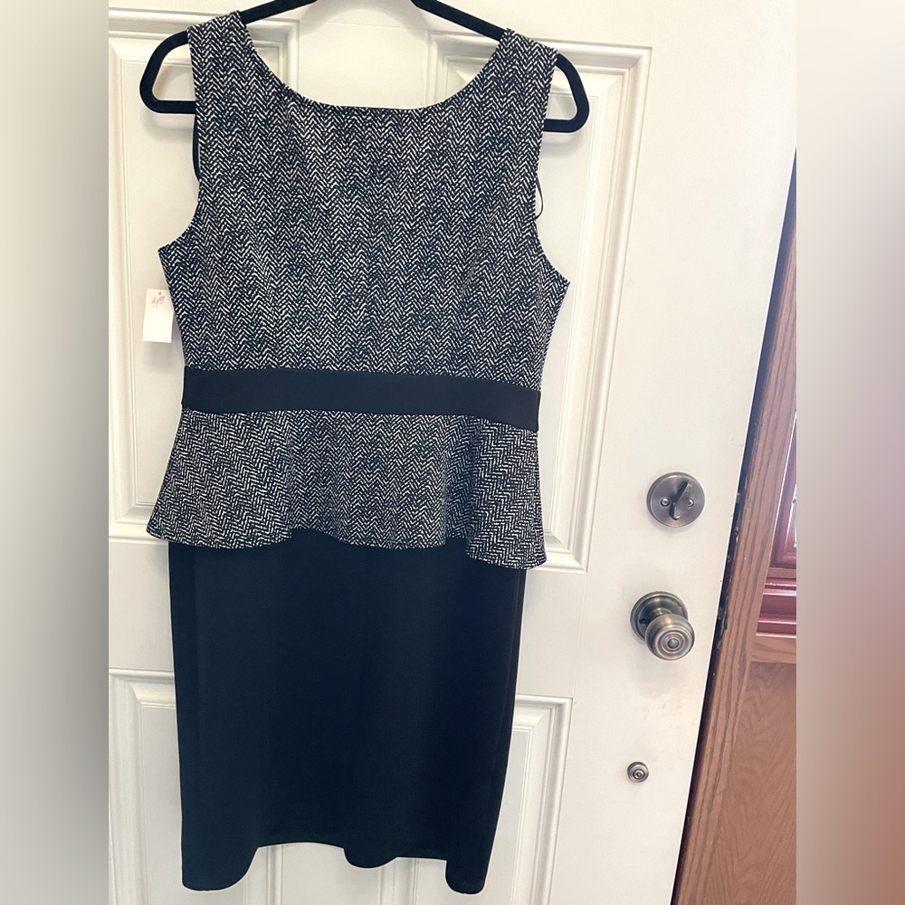 NWT Lovely Peplum dress in a black and white hue by AA Studio AA in a Size 12.